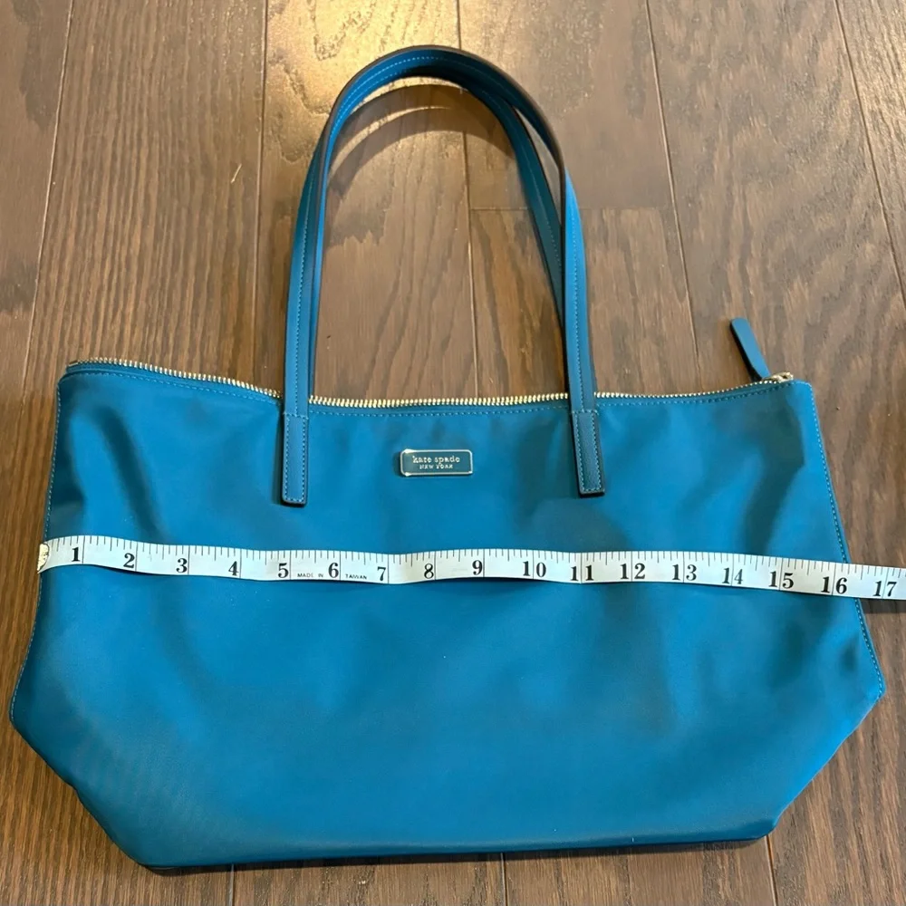 New kate spade teal nylon tote with gold-tone zipper.    Excellent condition.